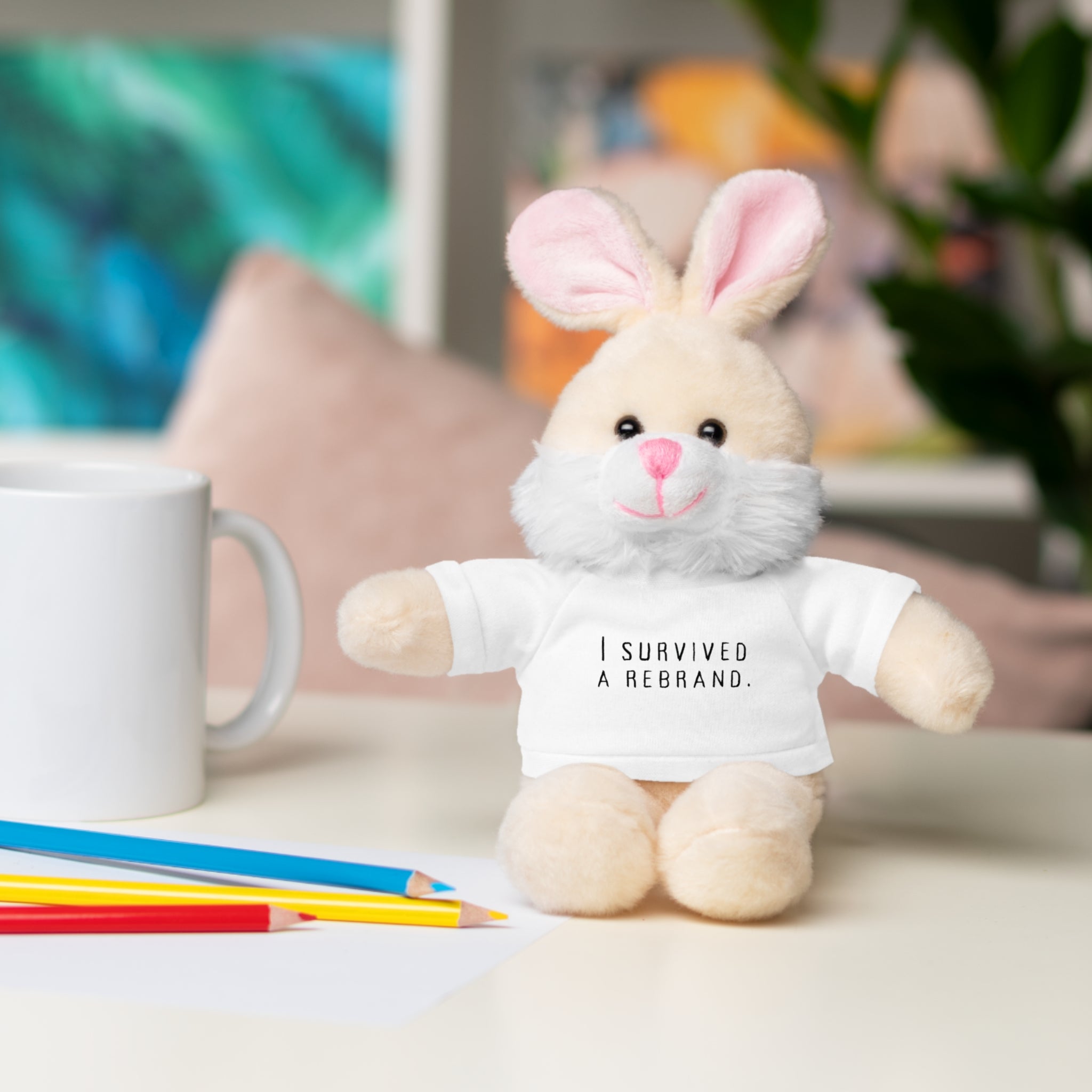 I Survived A Rebrand | Plush Stuffed Toy with Graphic Tee