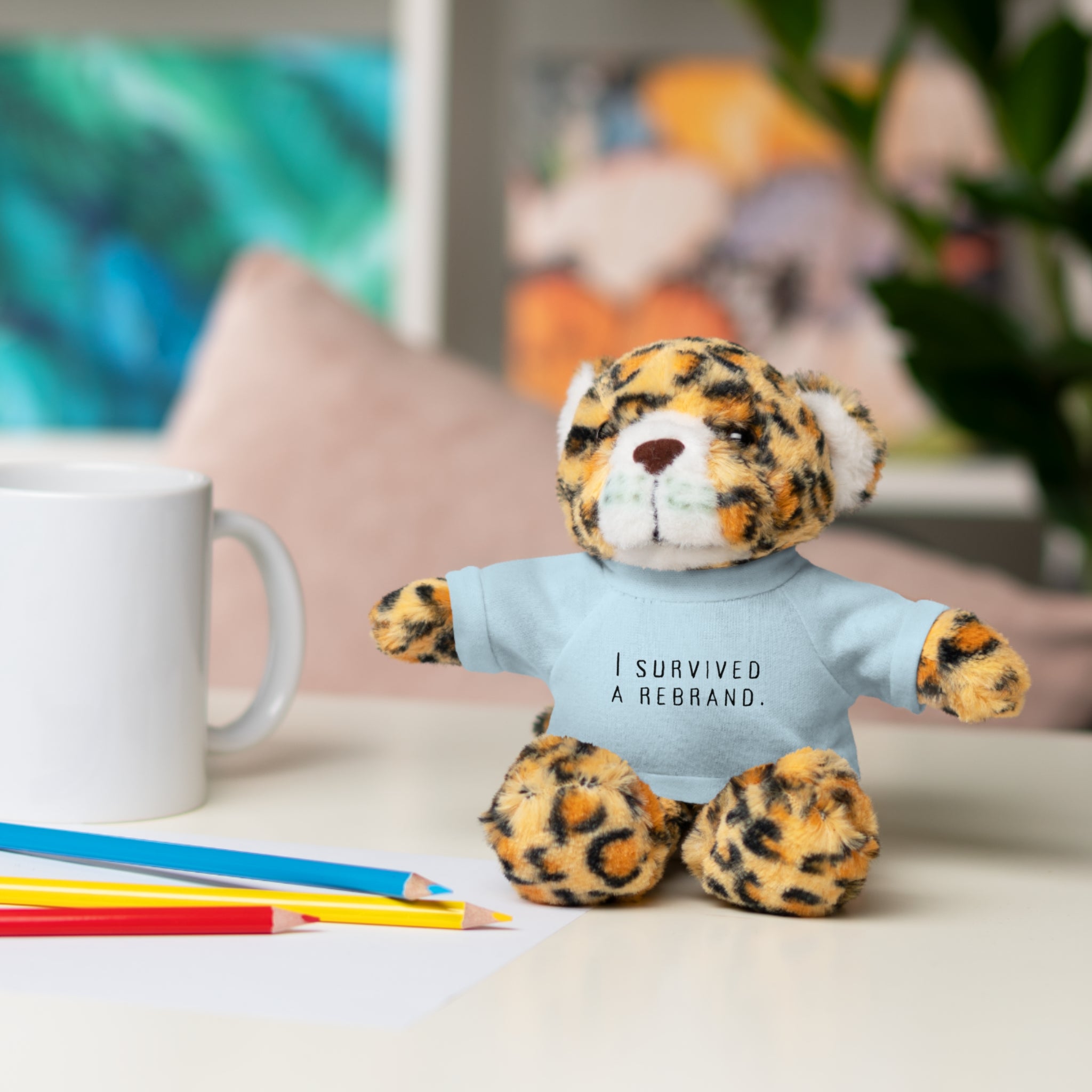 I Survived A Rebrand | Plush Stuffed Toy with Graphic Tee