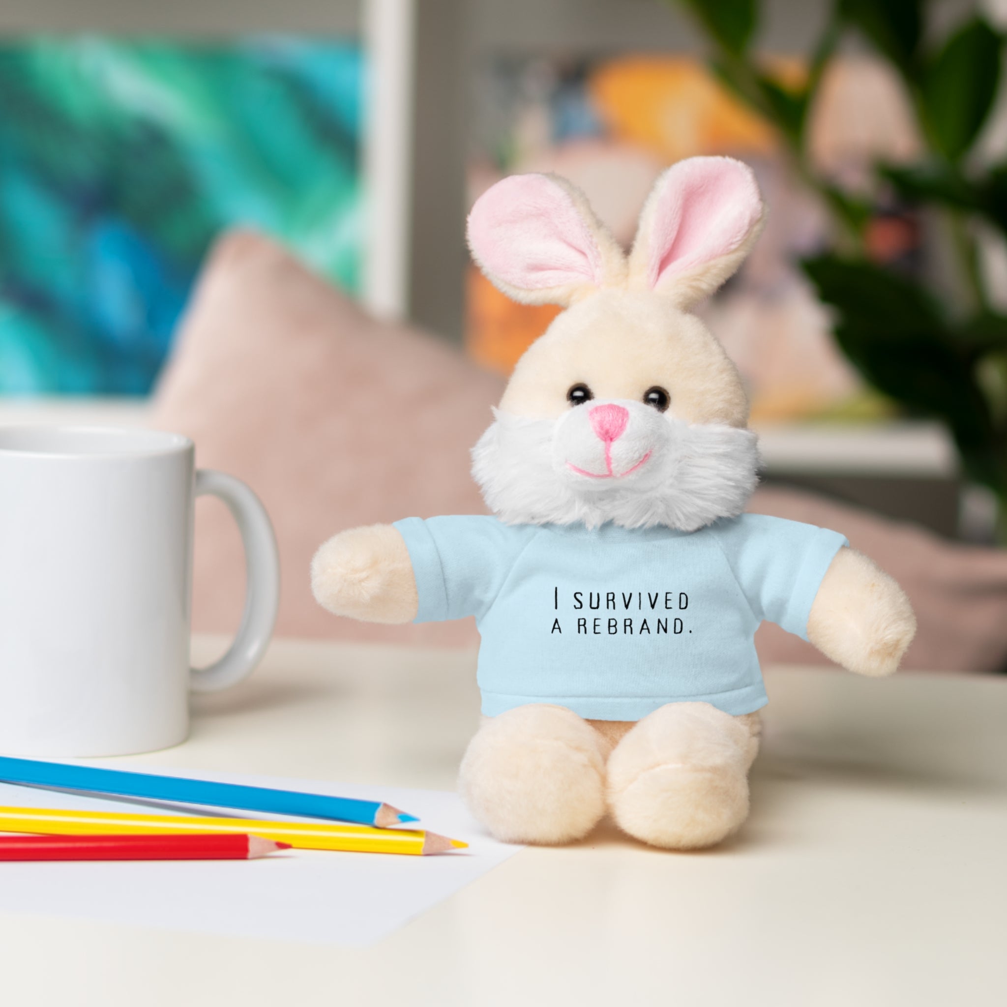 I Survived A Rebrand | Plush Stuffed Toy with Graphic Tee